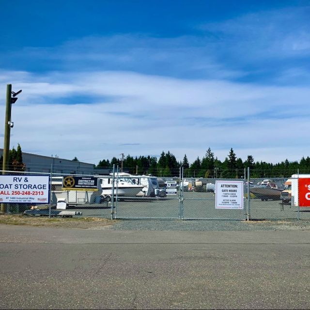 Outdoor Rv & Boat Storage sign, gate and yard for PQ Self Storage in Parksville